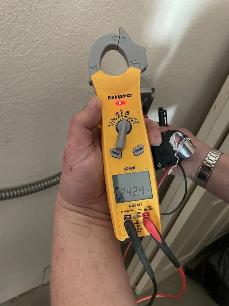 Voltage testing with clamp meter during Generator Installation in Stephenville